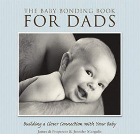 Dad Bonding with baby book